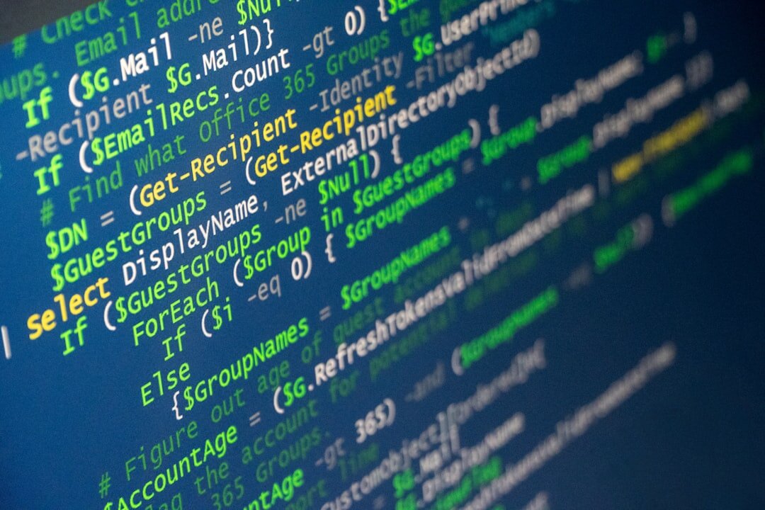 Software code on a dark monitor screen