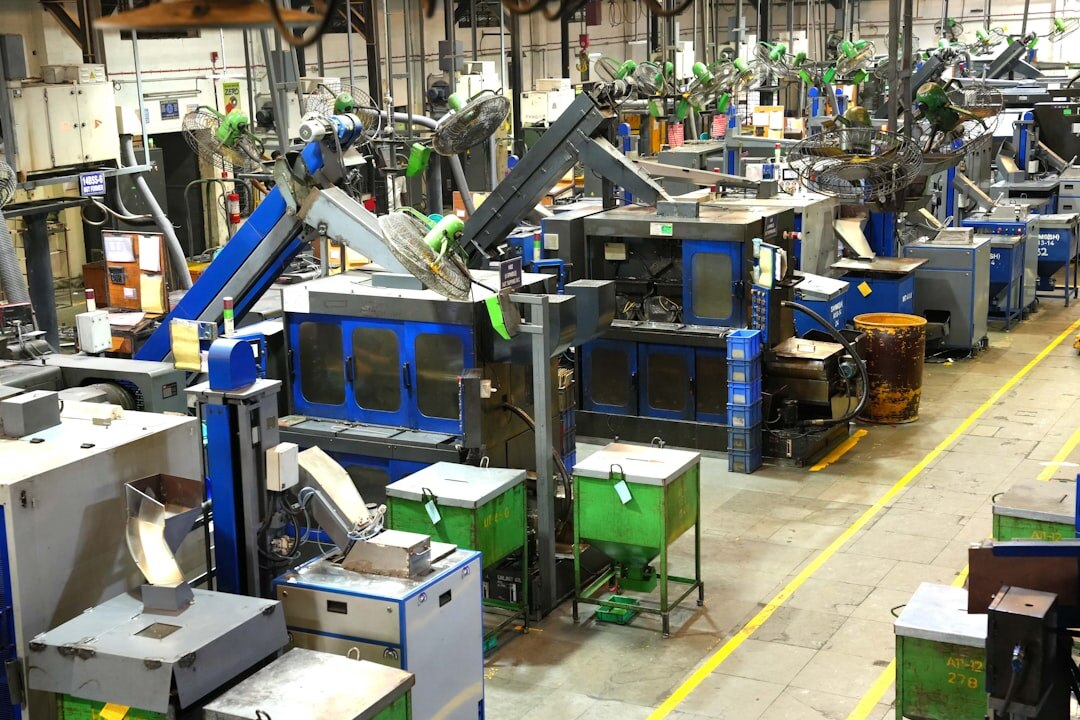 Factory automation with robotic arms on assembly line