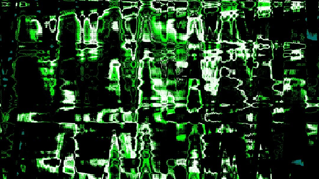 Green binary matrix code falling on screen